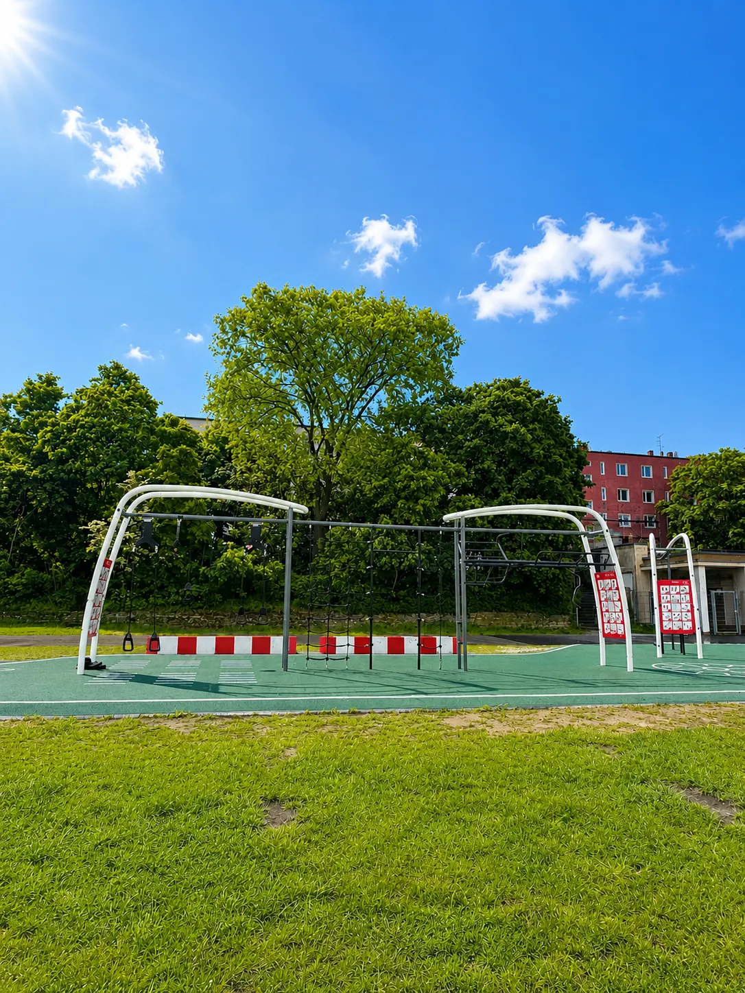 Outdoor calisthenics park under a blue sky